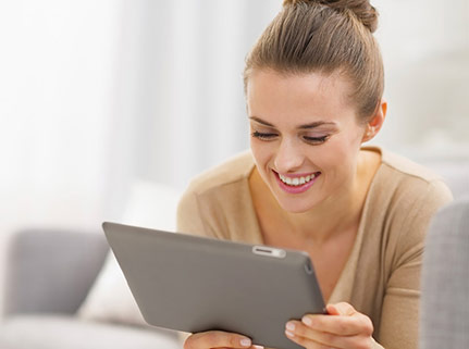 Image of young woman using a tablet